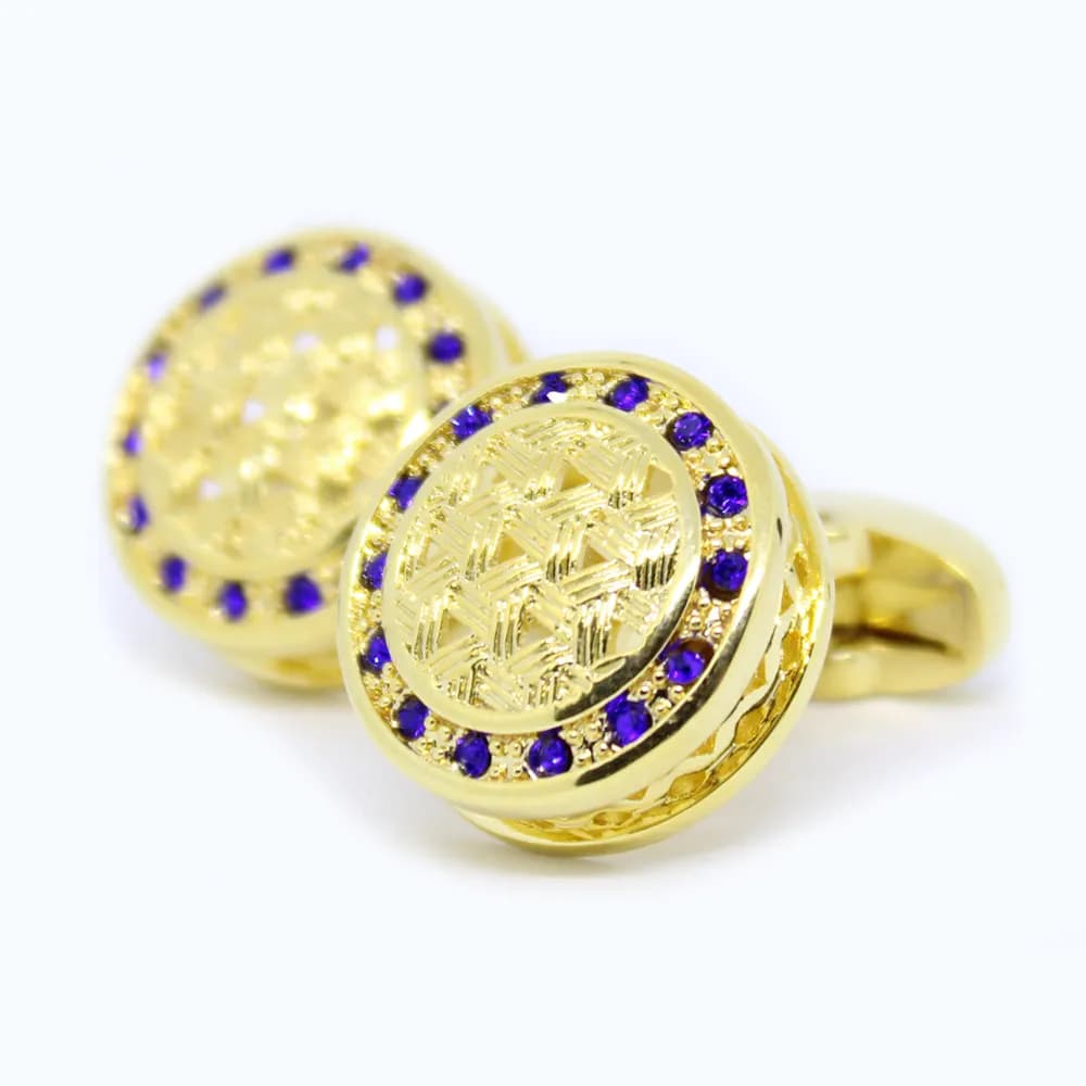 Ronde gouden manchetknoop - blauwe diamantjes